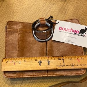 Brand new Pouchee purse